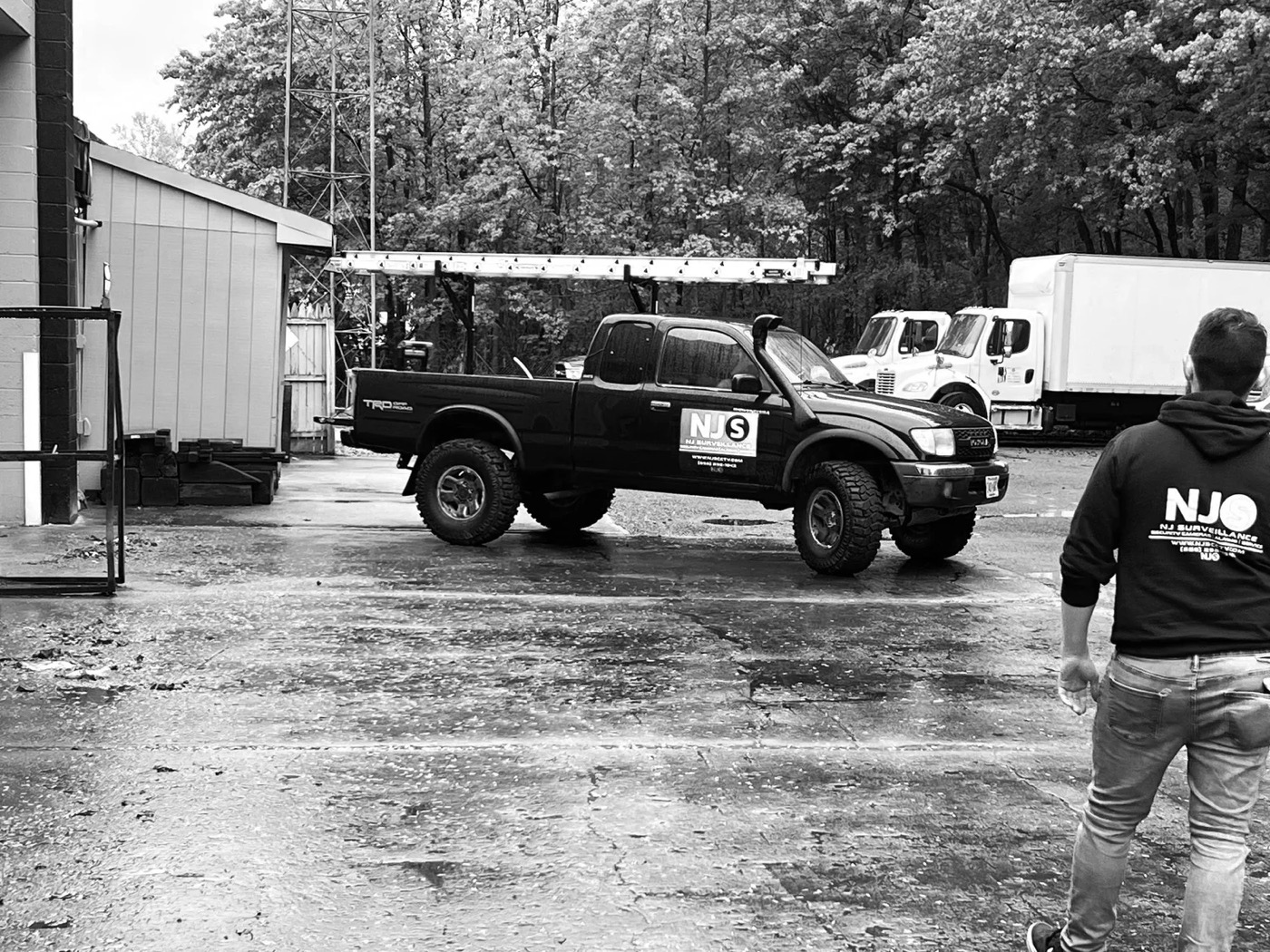 An NJS Surveillance truck and technician on site